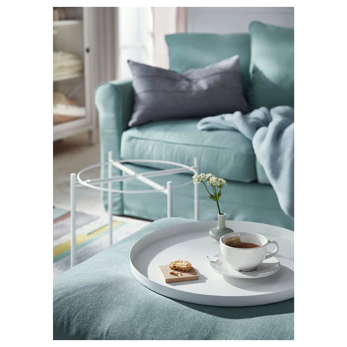 IKEA GLADOM white tray table on a balcony with small decorative items on the tray
