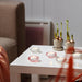 IKEA GLIMMA tealights arranged in a row on a surface creating soft ambient candlelight