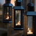  IKEA GLIMMA 100-pack tealights in lantern display showing burn quality and glow