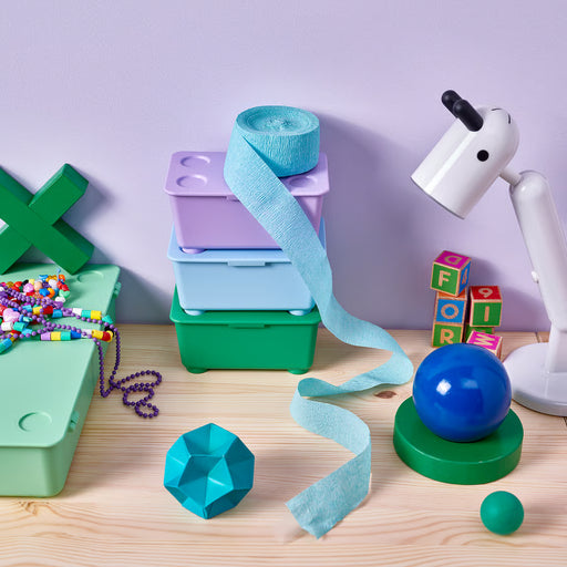  IKEA GLIS green lilac blue boxes with lids stacked on a children's desk with stationery organised inside
