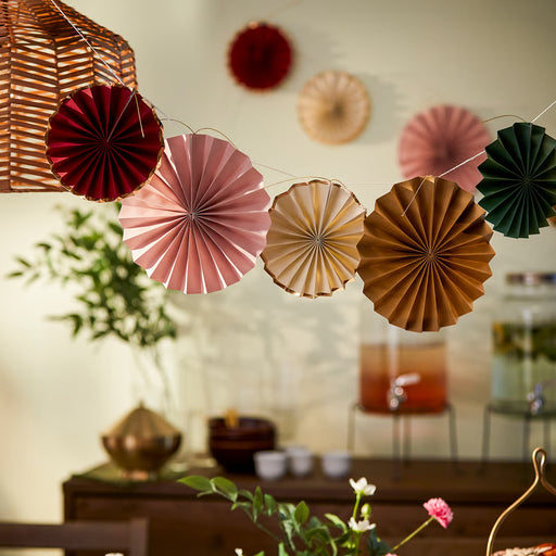 IKEA GOKVÄLLÅ multicolour paper ball decorations hung at varying heights in a decorated room setting