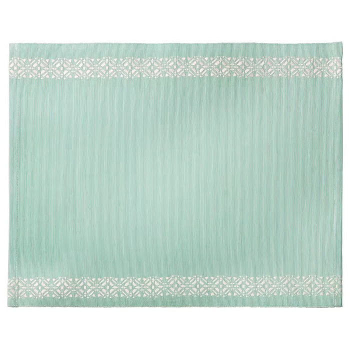 Embroidered Cotton Place Mat: A light blue place mat with white embroidery along the long sides, creating an elegant geometric pattern.