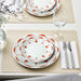 An image of a sleek and elegant orangeplate from IKEA, perfect for serving meals at a dinner party