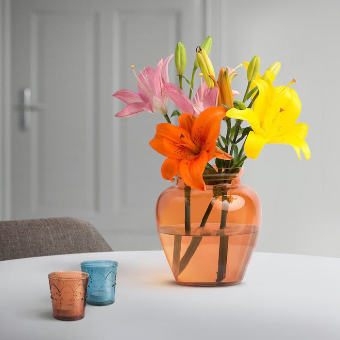 IKEA GOKVÄLLÅ 19 cm orange vase on a table, enhancing the room’s aesthetic with its vibrant color 00573857