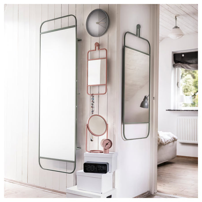IKEA GRANVÅG pink rectangular wall mirror with hanging rail above decor shelf