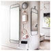 IKEA GRANVÅG pink rectangular wall mirror with hanging rail above decor shelf