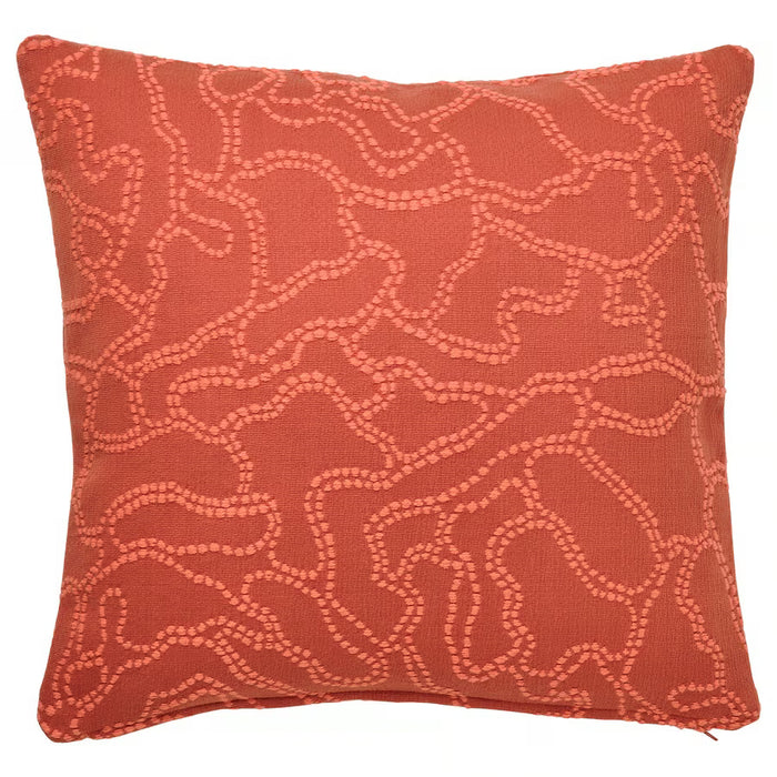 Red cushion with a wavy pattern on a white background