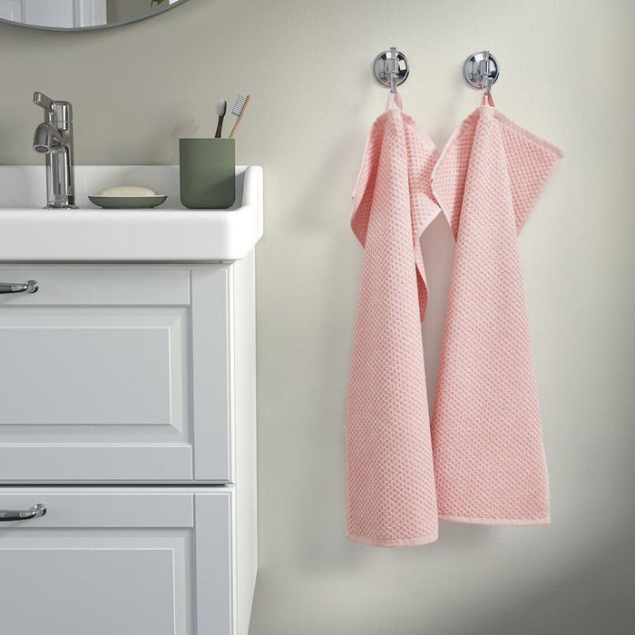 Pale pink IKEA GULVIAL hand towel, 40x70 cm, made of soft 100% cotton, perfect for bathrooms or kitchens. 60579724