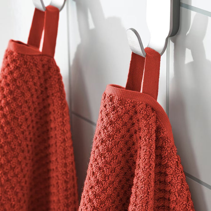 Digital Shoppy "IKEA washcloth hanging in a bathroom, showcasing its soft texture and absorbency."