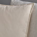 Close-up of IKEA GURLI cushion cover in smooth recycled cotton with neat stitching
