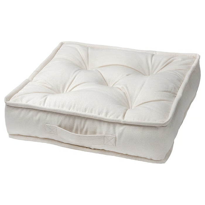 White quilted pet bed on a white background