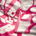 IKEA HÄRLIR duvet cover and matching pillowcases laid flat, white bright pink floral pattern

