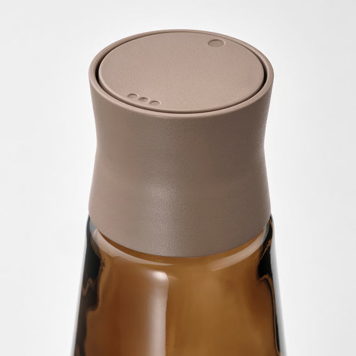  IKEA HALVTOM single amber brown glass spice jar with brown polypropylene cap side view