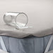 Water spilling on IKEA HAMPPALM waterproof mattress protector demonstrating liquid resistance
