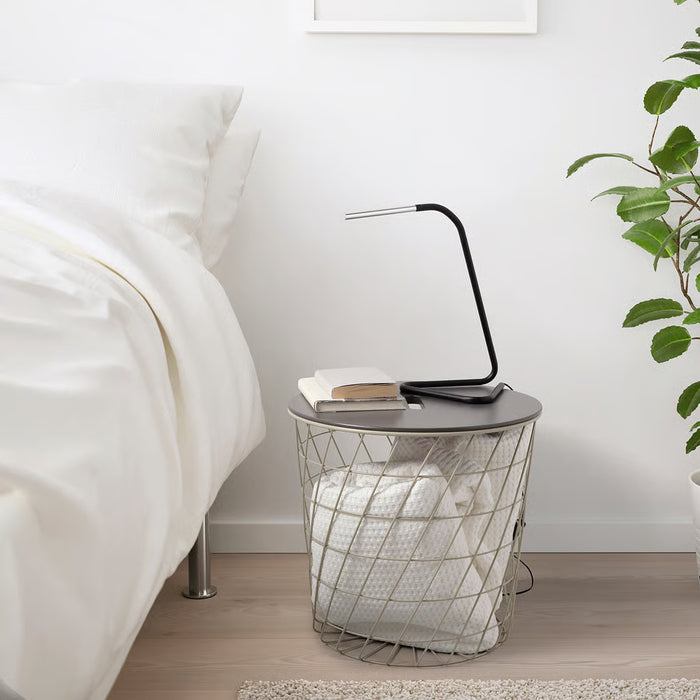 IKEA HÅRTE LED work lamp black silver lamp head tilted upward showing adjustable joint