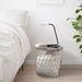 IKEA HÅRTE LED work lamp black silver lamp head tilted upward showing adjustable joint