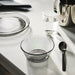 IKEA HAVSGÄDDA pink glass bowl serving blueberries and whipped cream beside a cup of coffee