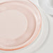 Close-up of IKEA HAVSGÄDDA pink ridged tempered glass side plate showing stripe pattern detail