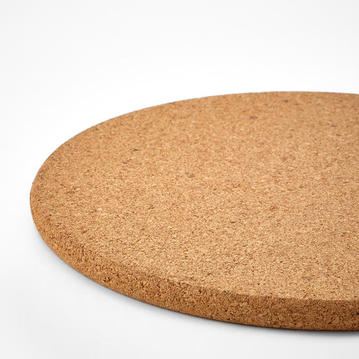 Close-up of IKEA HEAT cork pot stand 19cm showing natural cork texture and material detail