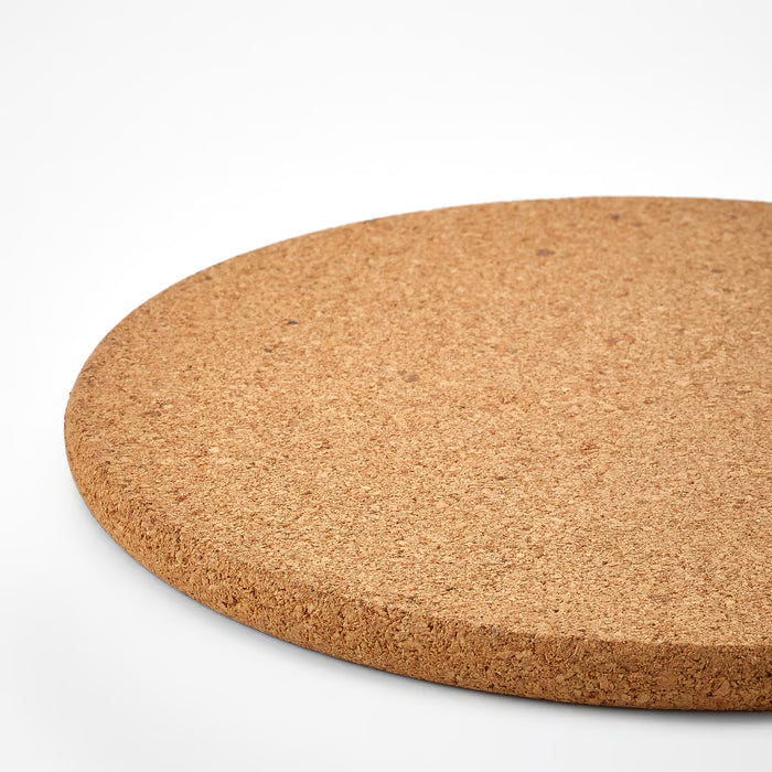 Close-up of IKEA HEAT cork pot stand 19cm showing natural cork texture and material detail