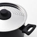 Close-up of IKEA HEMLAGAD pot lid with vent holes and comfortable handle