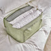 IKEA HEMMAFIXARE floral storage cases stacked in PAX wardrobe showing shape retention and organisation