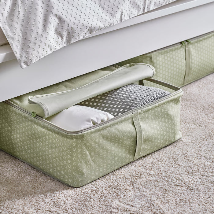 IKEA HEMMAFIXARE pale grey-green storage case placed on a wardrobe shelf with clothes inside