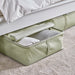 IKEA HEMMAFIXARE pale grey-green storage case placed on a wardrobe shelf with clothes inside