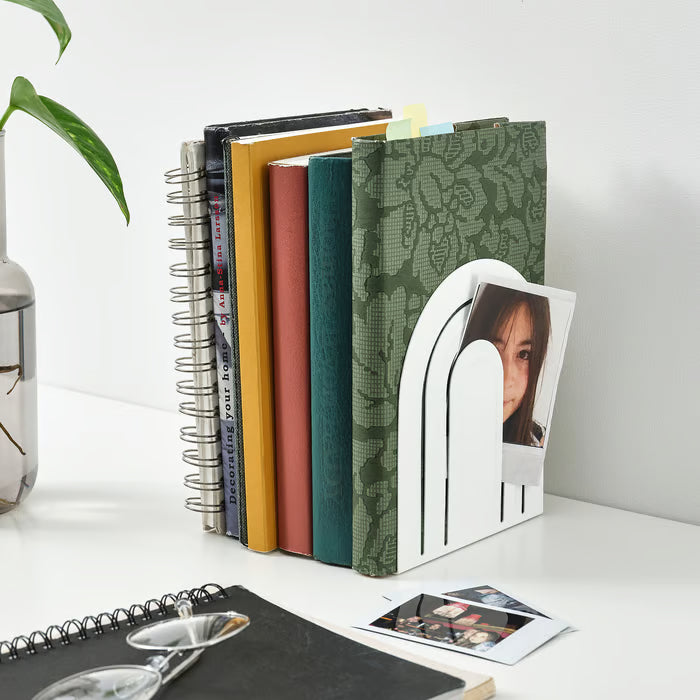 IKEA HÖSSLÄ book-end white with note wedged in side opening on desk