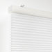 Digital Shoppy White cellular blind covering a window, providing privacy and style. 60290638