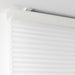 Close-up of IKEA HOPPVALS white cellular blind texture-30290625