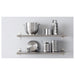 IKEA IDEALISK grater stored on stainless steel kitchen shelf with other cooking utensils