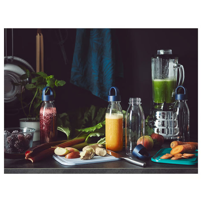 IKEA 365+ red blue and green chopping boards on table with assorted vegetables and food