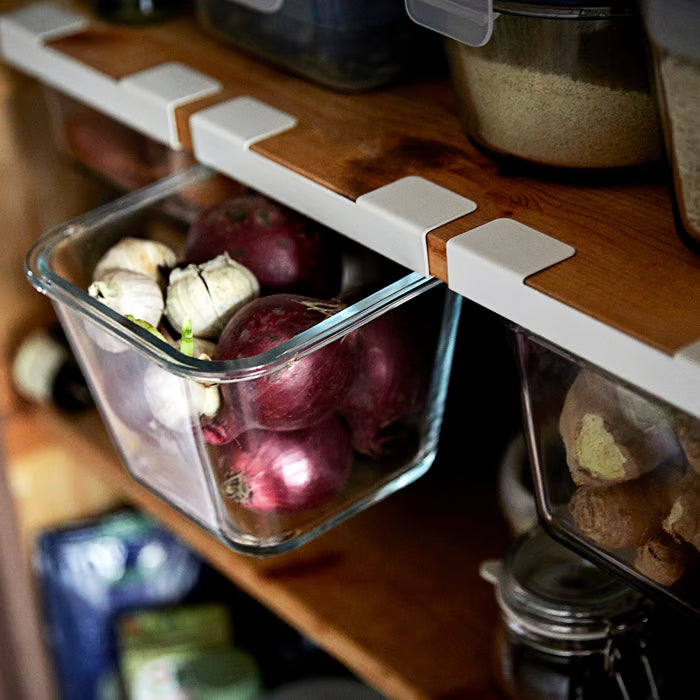 IKEA 365+ square glass container storing onions and garlic in refrigerator organisation setup
