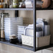  IKEA IKEA 365+ clear square food containers arranged neatly on a kitchen shelf