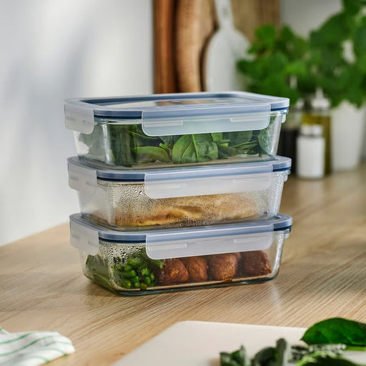  IKEA 365+ glass food containers with blue lids holding prepared meals for fridge storage and meal prep