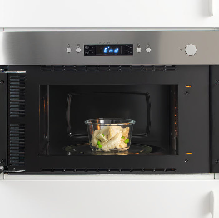 IKEA 365+ glass food container inside microwave showing microwave-safe use