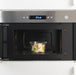 IKEA 365+ glass food container inside microwave showing microwave-safe use