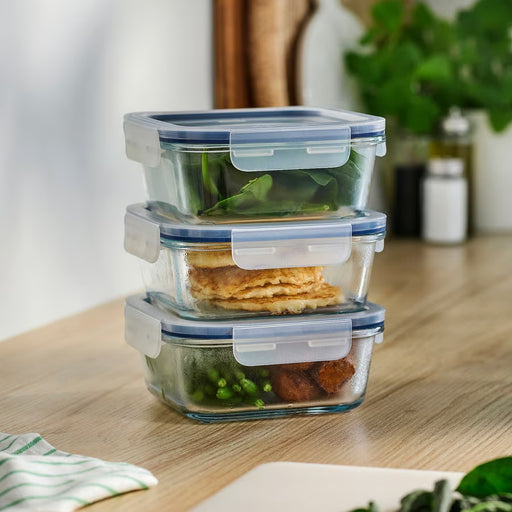 Three IKEA 365+ blue-lid glass food containers stacked on a table, square shape, 600ml each