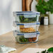 Three IKEA 365+ blue-lid glass food containers stacked on a table, square shape, 600ml each