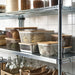 IKEA 365+ containers on kitchen shelf with bamboo lids holding fresh fruits