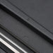 Close-up of IKEA 365+ black mandoline slicer showing smooth blade surface and secure rubber grip edges