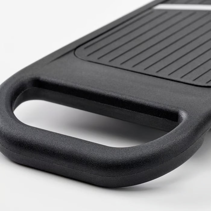 IKEA 365+ black mandoline slicer side view showing handle, grooves, and thickness adjustment dial