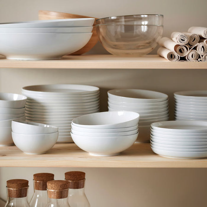  IKEA 365+ white porcelain side plates and bowls stacked neatly on open kitchen shelves