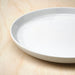 IKEA 365+ white plate 24cm stacked with other IKEA 365+ dinnerware showing rim detail