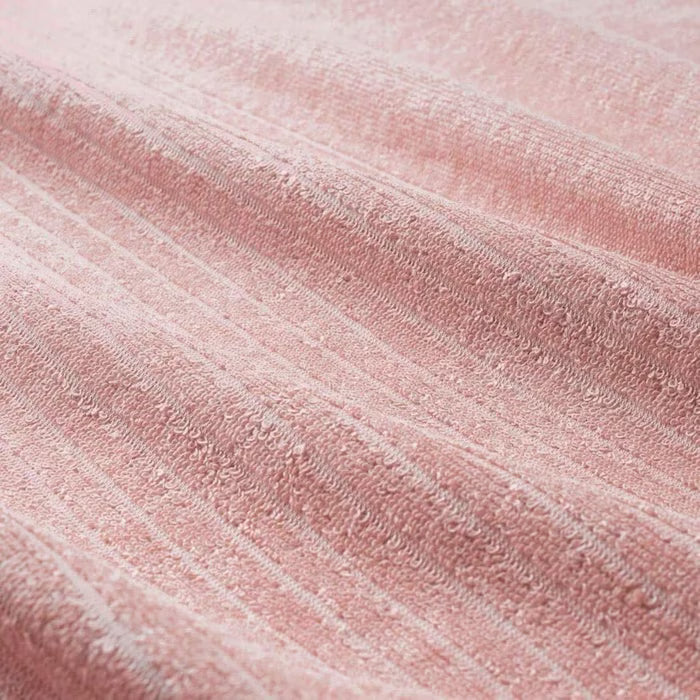 IKEA VÅGSJÖN light pink hand towel folded neatly close-up showing soft cotton terry weave