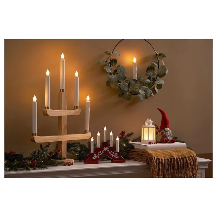 IKEA STRÅLA mini red candelabra side angle showing slim 3 cm depth and 5-arm Scandinavian silhouette