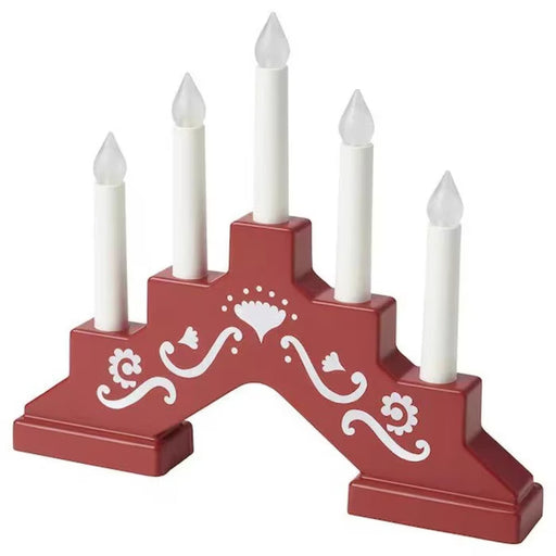 IKEA STRÅLA LED 5-armed candelabra battery operated mini red front view warm white glow on table #00532391