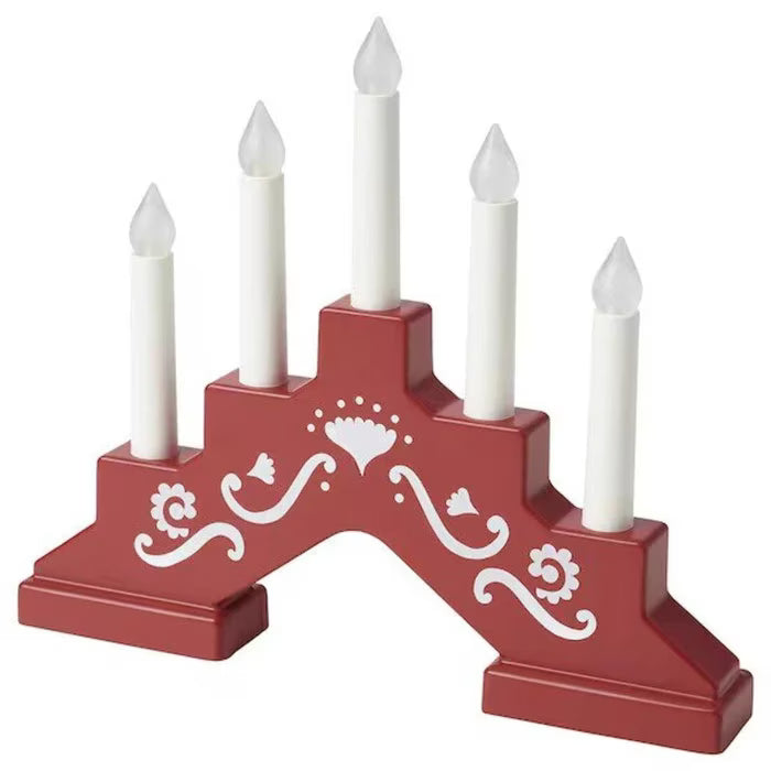 IKEA STRÅLA LED 5-armed candelabra battery operated mini red front view warm white glow on table #00532391