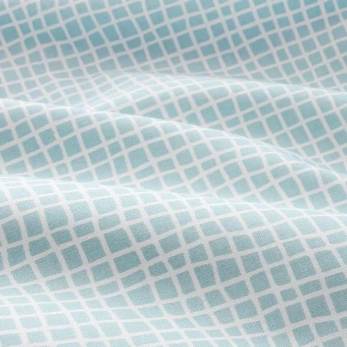 IKEA KLÄMMIG turquoise pillowcase close-up showing cotton fabric texture and colour
